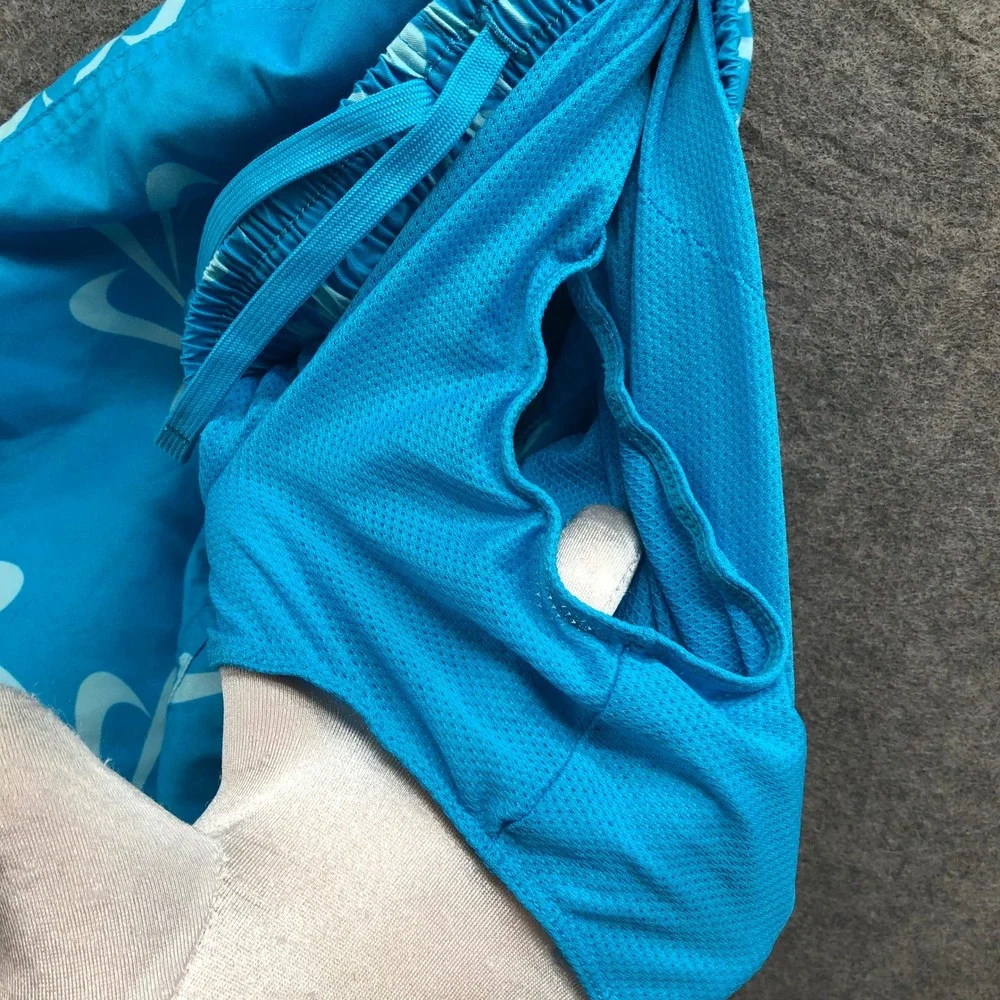 Nike Boys XL (18-20)‎ Swim Trunks Blue Swoosh Logo Print Mesh Lined 8'' Youth